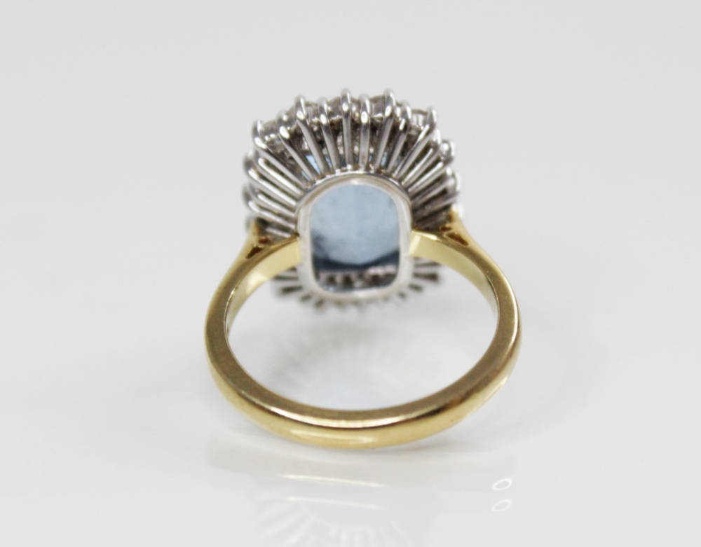 An aquamarine and diamond 18ct gold cluster ring, the central rectangular mixed cut aquamarine ( - Image 5 of 7