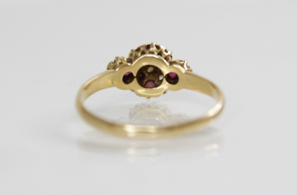 An Edwardian ruby and diamond 18ct gold ring, the quatrefoil head set with four untested round mixed - Image 2 of 6