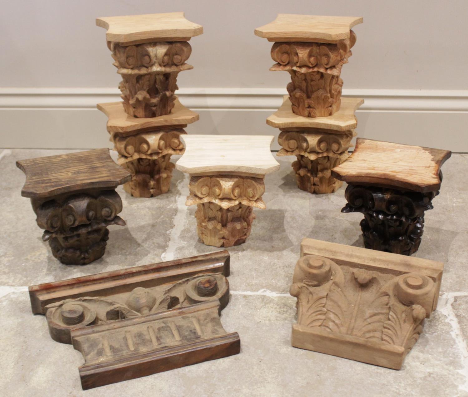 Five carved architectural wall capitals, of composite form (combining Corinthian and Ionic