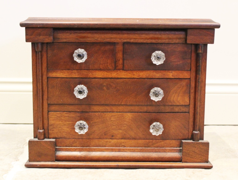 A Victorian mahogany apprentice/specimen chest, in the form of a Scottish chest, with an arrangement