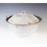 An early 20th century glass plafonnier, the reeded glass shade within a white metal rim, extending