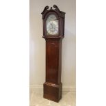 A George III oak cased eight day longcase clock by 'W M Townly, Chepstow', the 30cm brass dial