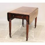 A mid 19th century mahogany Pembroke table, the rectangular moulded top with rounded corners above a