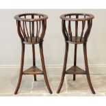 A pair of stained hardwood jardinere stands, 20th century, each with a circular moulded collar