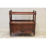 A Victorian mahogany dumb waiter, the three quarter galleried top shelf enclosed by octagonal urn