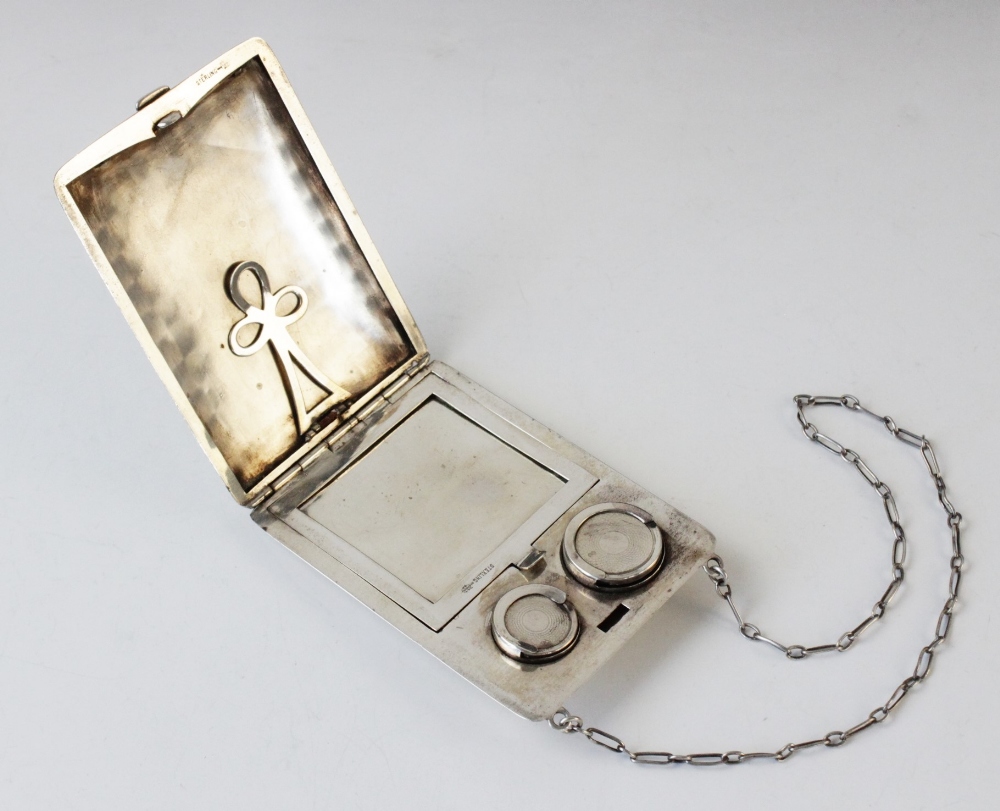 A sterling silver minaudiere by Webster Company, of rectangular form with engine turned decoration