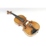 A violin, 19th century with later additions and modifications, the 27cm long body with two piece