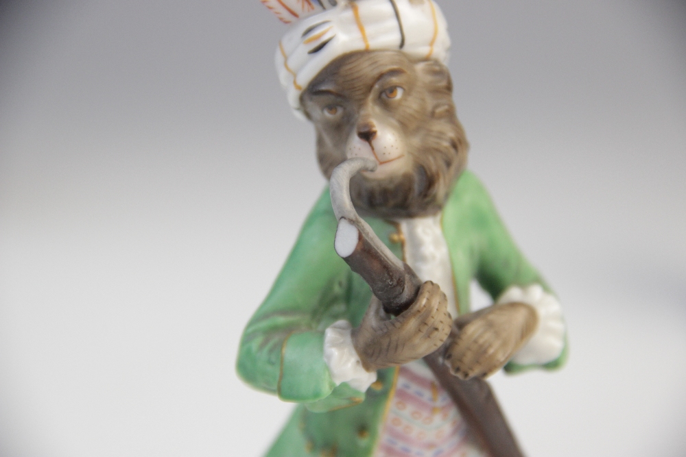 An eight piece German porcelain monkey band, 19th century, comprising: a conductor, a violinist, a - Image 7 of 8