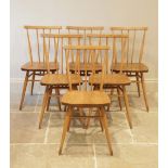 A set of six 1960's Ercol blonde elm and beech wood kitchen chairs, each chair with a stick back