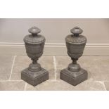 A pair of painted hardwood lamp bases, late 20th century, in the form of classical urns, each carved