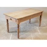 A Victorian pine scrub top kitchen table, the rectangular plank top with rounded corners above a