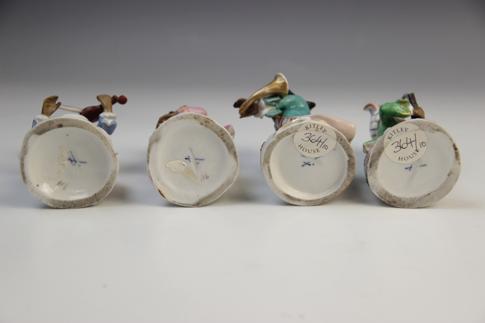 An eight piece German porcelain monkey band, 19th century, comprising: a conductor, a violinist, a - Image 4 of 8