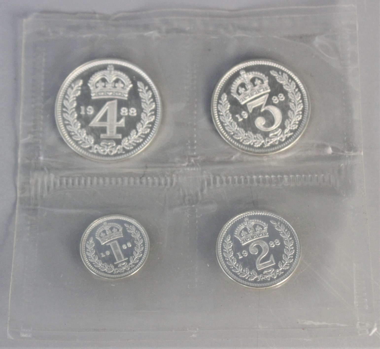 Three sealed Royal Mint sets of four Maundy money coins, each dated 1988, in a white leather - Image 3 of 5