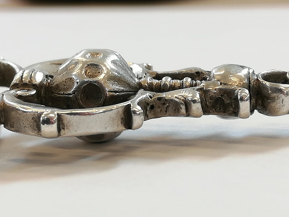 A 19th century silver coloured three-sided swivel fob pendant, each oval face with an engraved - Image 7 of 7