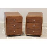 A pair of stained plywood retro bedside cabinets, late 20th century, each of rounded rectangular