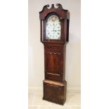 A large George IV oak and mahogany cross banded eight-day longcase clock, the 36cm painted break