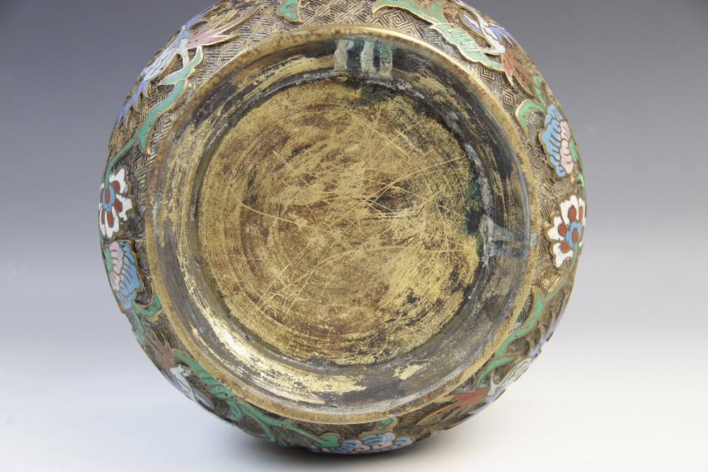 A Chinese bronze and enamel footed bowl, decorated with relief cast enamelled floral and foliate - Bild 2 aus 2