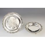 A Victorian silver card tray by George John Richards, London 1848, of circular form with cast rim