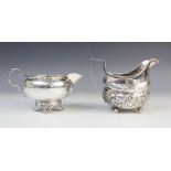 A George III silver milk jug, maker's marks for 'ID', London 1808, of oval baluster form on four