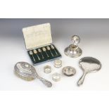 A George V silver mounted capstan inkwell by Deakin & Francis, Birmingham 1925, with weighted