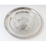 A silver commemorative salver for the Silver Wedding Anniversary of Her Majesty Queen Elizabeth II