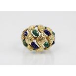 An 18ct gold enamelled 'bombe' ring, the openwork woven design head with textured engraving and blue