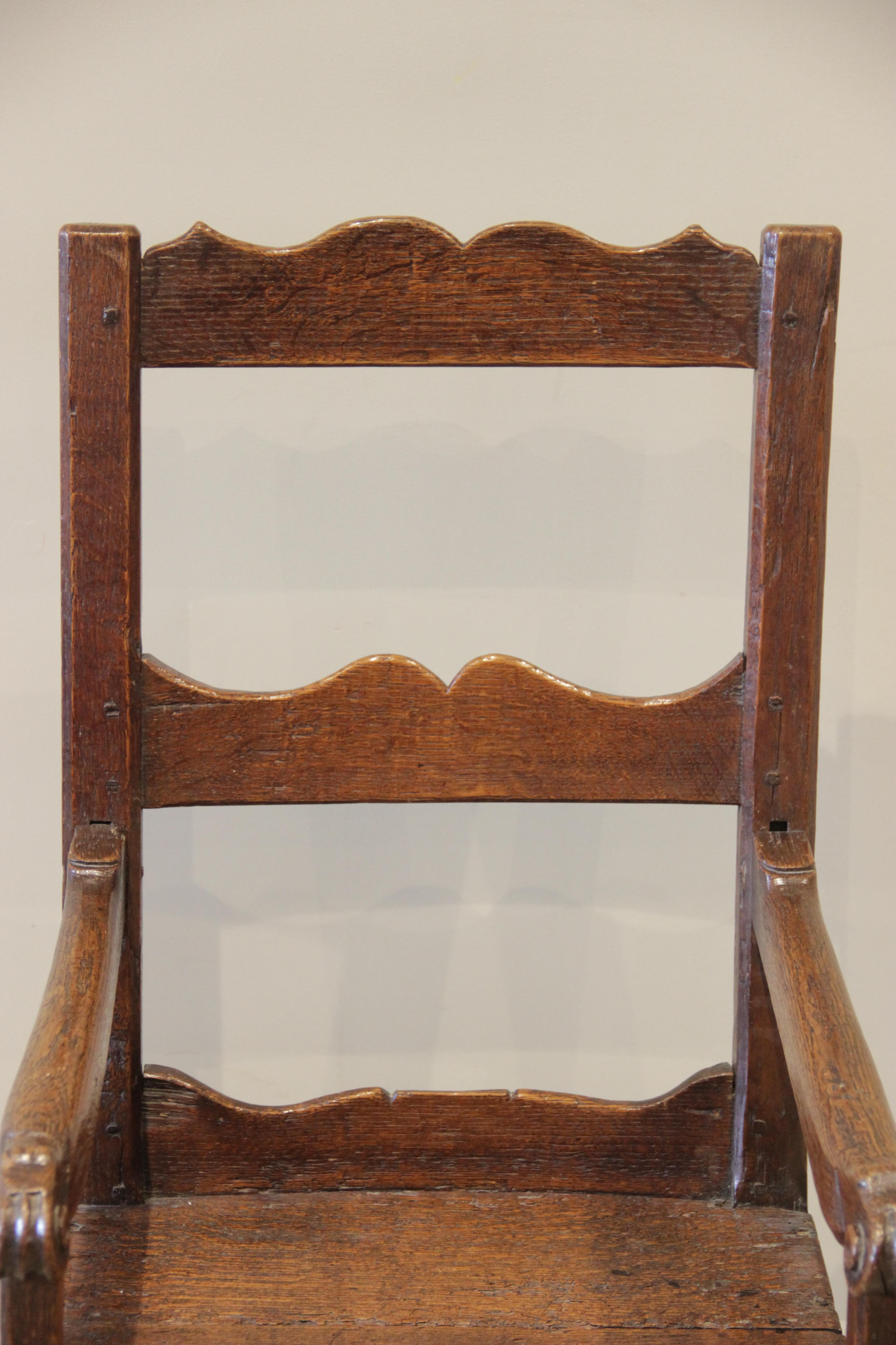A 16th century jointed oak armchair, the two wavy back rails supported on chamfered supports - Image 2 of 14