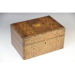 A Victorian walnut and parquetry banded sewing box, the hinged cover opening to a