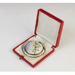 An early 20th century Austrian silver and enamel compact, of circular form decorated in polychrome