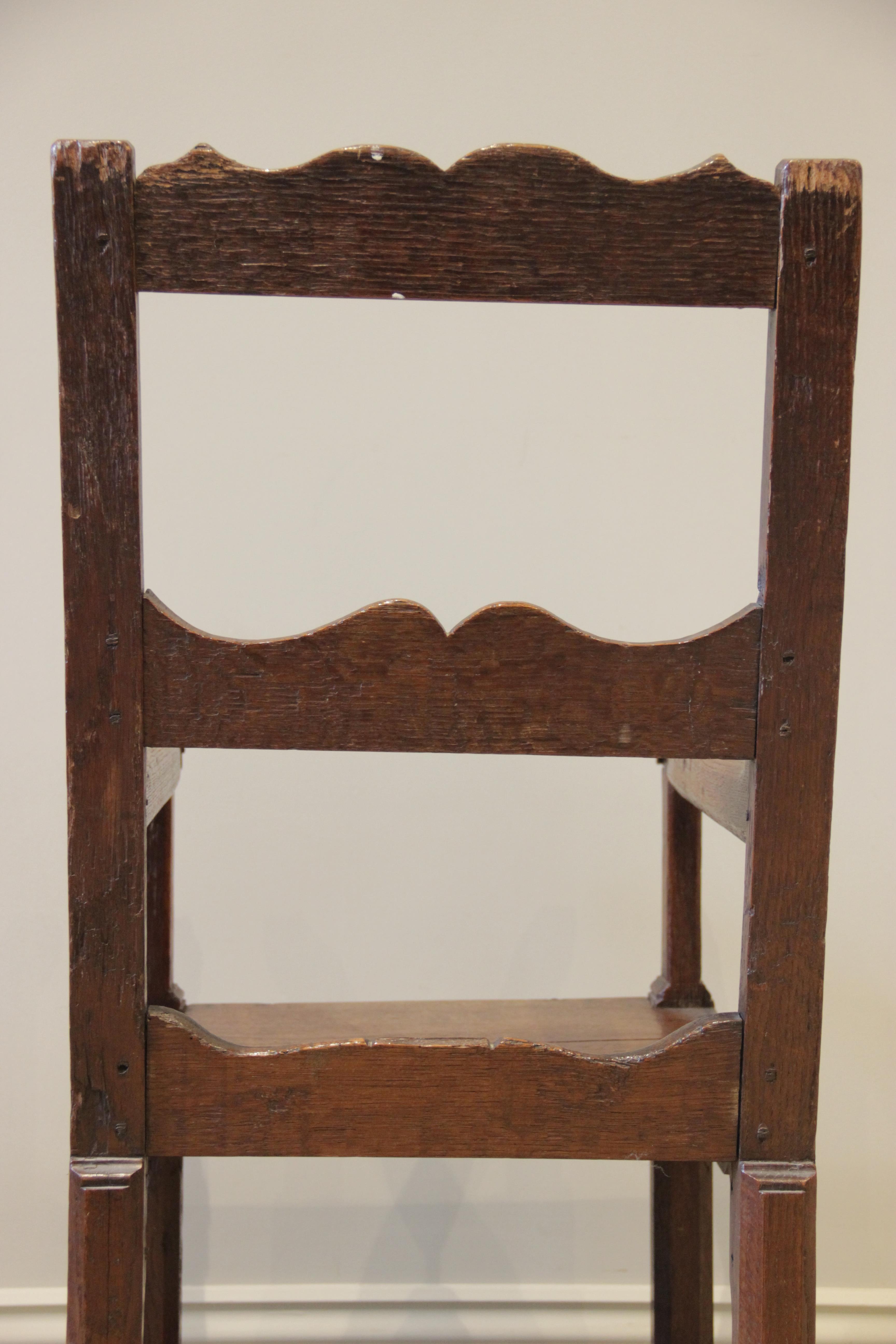 A 16th century jointed oak armchair, the two wavy back rails supported on chamfered supports - Image 5 of 14