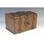A European late 17th/early 18th century oak casket, of gently domed form, applied with an iron swing