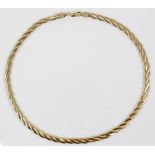 A 9ct gold collarette, designed as two braided herringbone chains with lobster claw and loop
