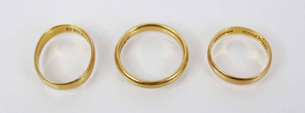 A 22ct gold wedding band, marks for Birmingham 1960, ring size M 1/2, together with a further 22ct - Image 2 of 2