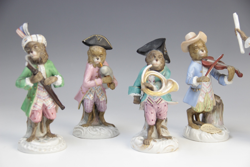 An eight piece German porcelain monkey band, 19th century, comprising: a conductor, a violinist, a - Image 2 of 8