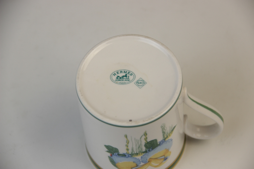 A Hermes porcelain mug in the Toucan pattern, late 20th century, printed Hermes marks to base, 9.5cm - Image 2 of 4