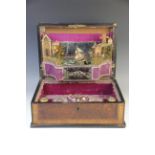 A French 19th century diorama automaton music box, the birds eye maple hinged cover within a