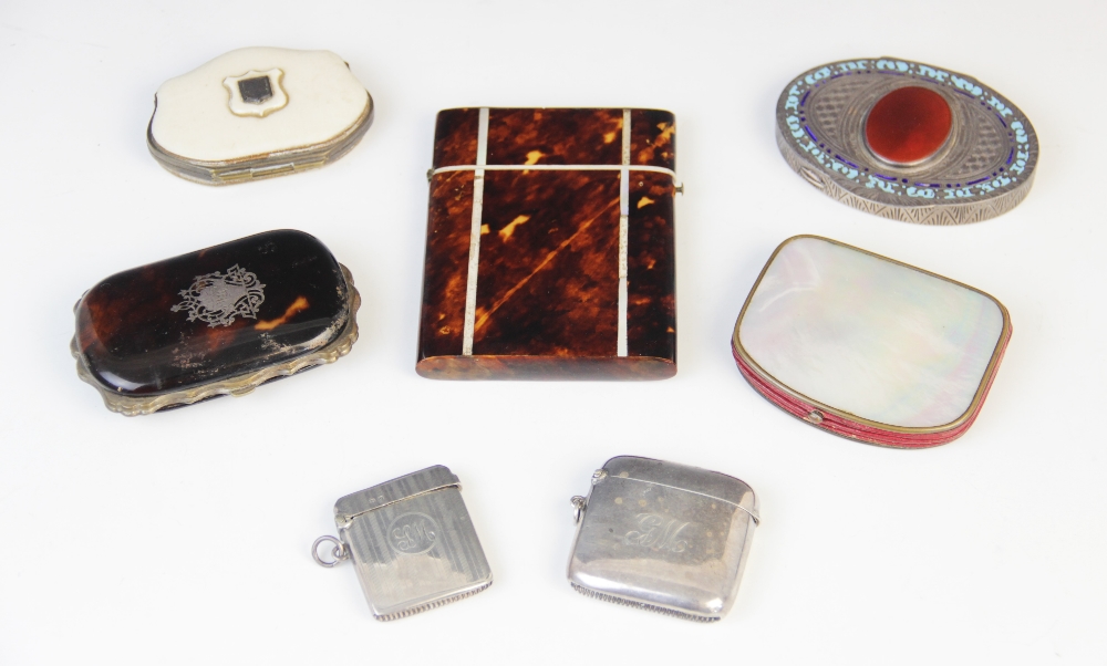 A selection of 19th century and later purses, vestas, compacts and card cases, to include a