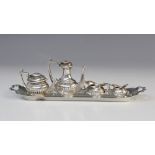 A miniature silver tea and coffee service by A Marston & Co, Birmingham 1973, comprising teapot, 3cm