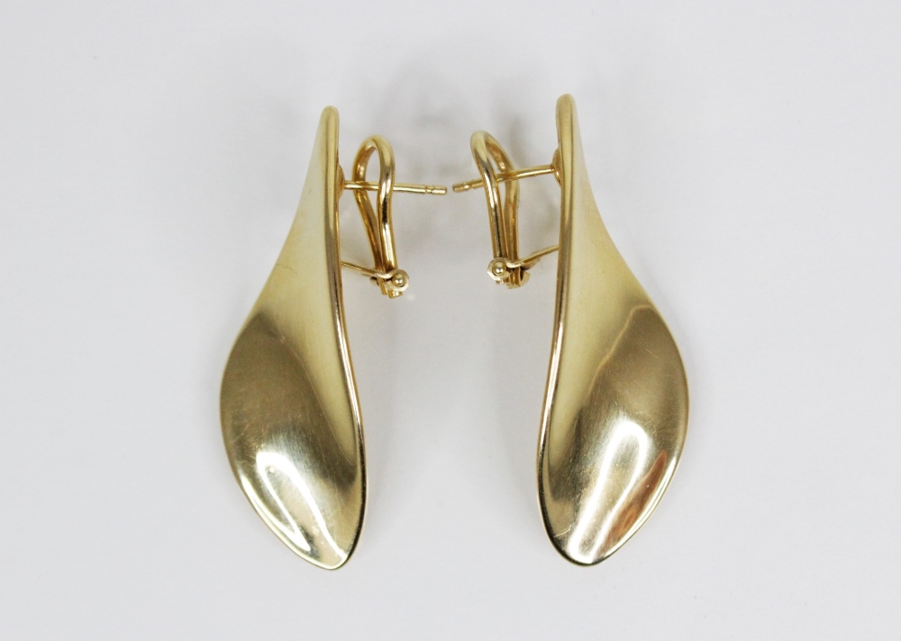 A pair of 18ct yellow gold abstract design earrings, each of plain polished twist form with post and