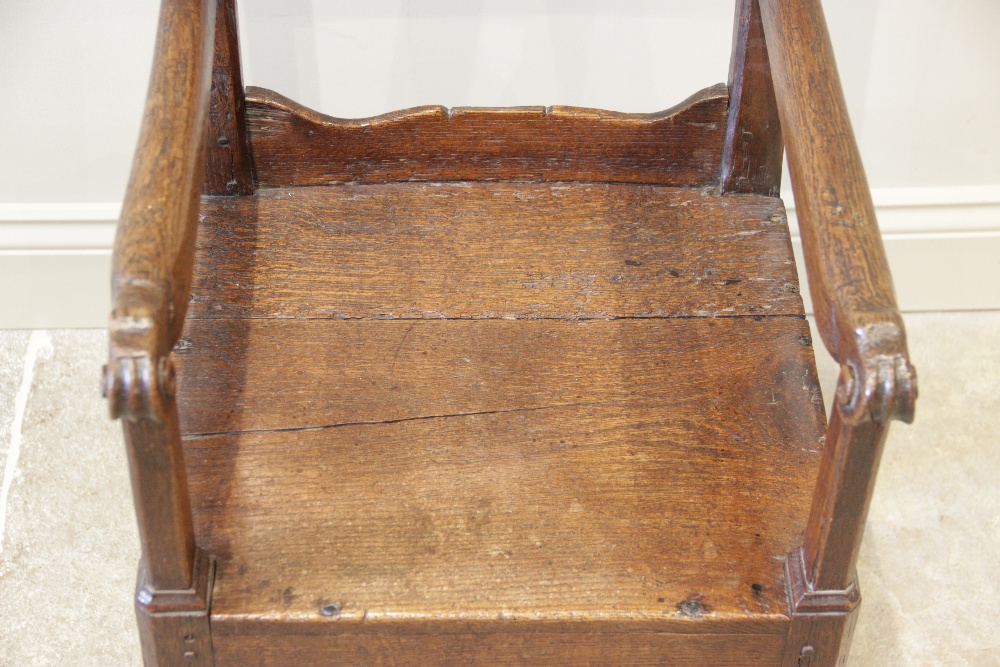 A 16th century jointed oak armchair, the two wavy back rails supported on chamfered supports - Image 3 of 14