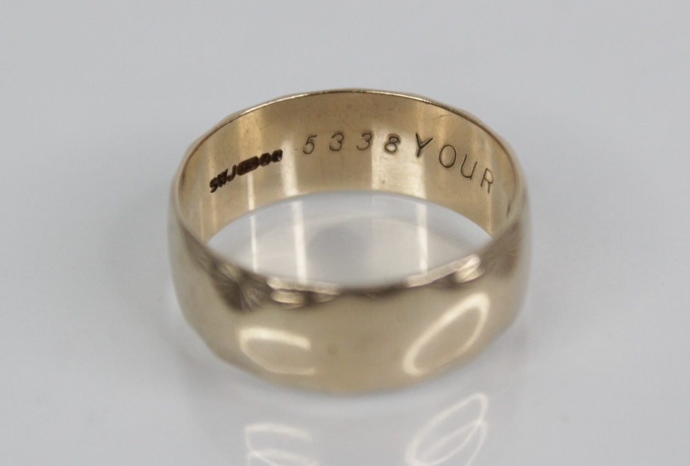 A 9ct gold wedding band, with scalloped star-cut border decoration, engraved 'YOUR HAPPINESS' to - Image 3 of 3