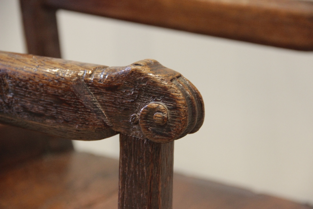 A 16th century jointed oak armchair, the two wavy back rails supported on chamfered supports - Image 7 of 14