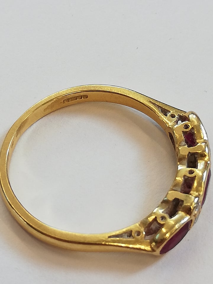 A ruby and diamond 18ct gold ring, comprising three (untested) oval mixed cut rubies, each - Image 5 of 6