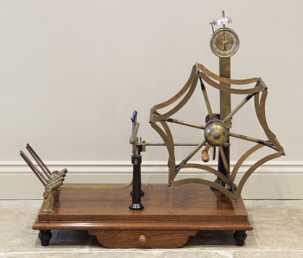 An early 20th century silk/yarn winder by Goodbrand & Co, Stalybridge, the hexagonal pulley wheel