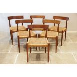 A set of six 1960's Danish teak dining chairs by Arne Hovmand for Mogens Kold, each chair with a