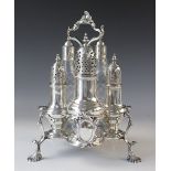 A George III silver cruet stand by Thomas & Jabez Daniell, London 1772, cinquefoil form with central