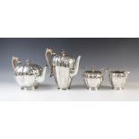 A four-piece silver tea service by Mappin & Webb, Sheffield 1975, comprising teapot, hot water