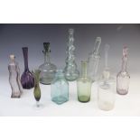 A collection of bottles, decanters and other tall vessels, 20th century 19th century and later, to