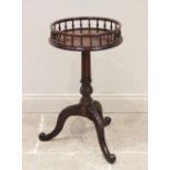 A 19th century and later Chippendale style galleried mahogany wine table, the circular top with a