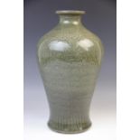 A Chinese Longuan celadon vase, Ming dynasty style, of inverted baluster form with incised foliate
